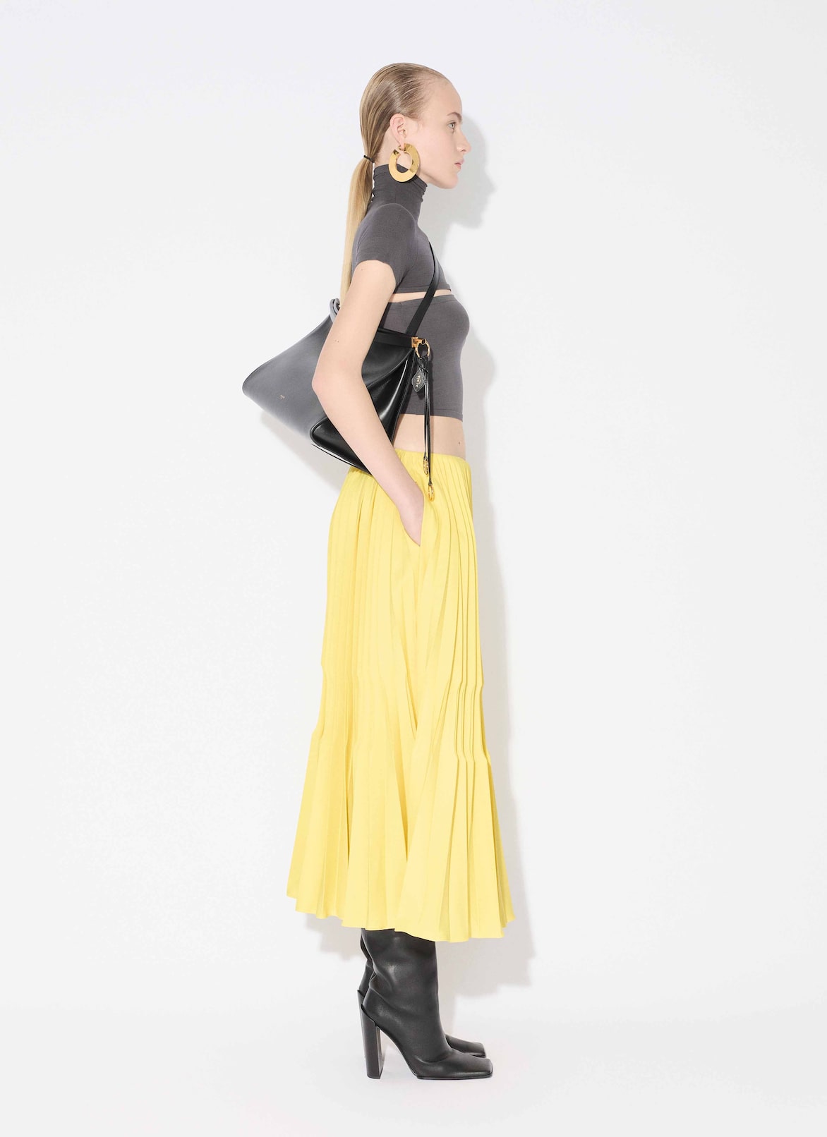 WOOL GABARDINE PLEATED SKIRT ALAÏA BRIGHT YELLOW WOOL GABARDINE PLEATED SKIRT